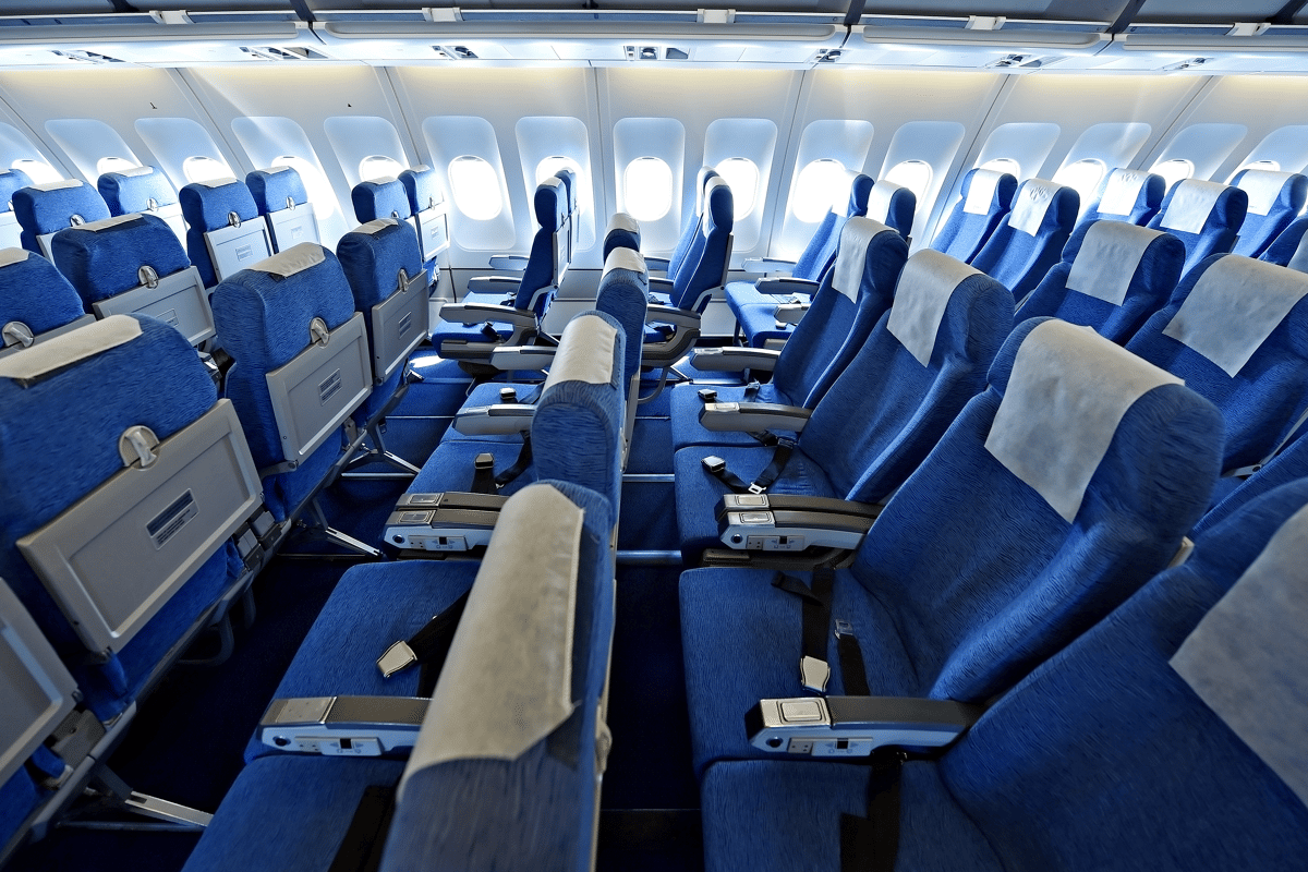 What are the different cabin classes on airplanes?