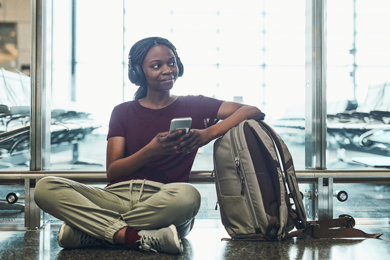 airport-girl-phone-music