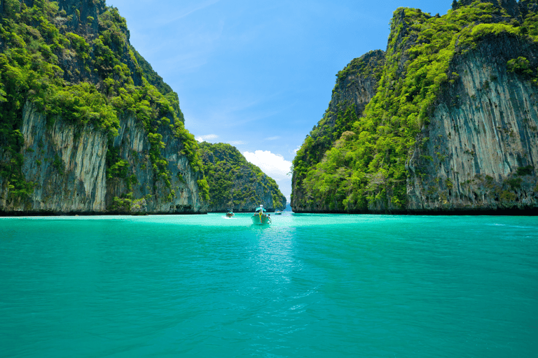 asia-thailand-boats-between-giant-rocks