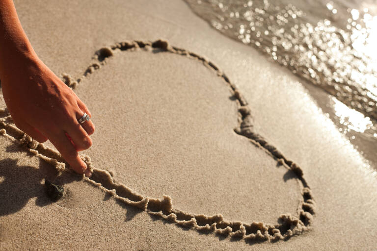 beach-wedding-sand-drawing-heart