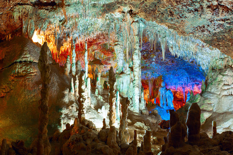 bigstock-Colorful-stalactites-and-stala-92600111