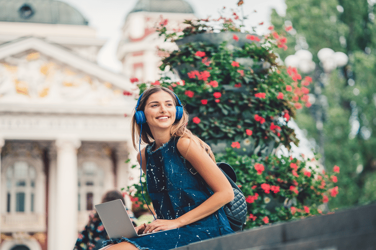 blog-generic-travel-podcasts-ear-phones-laptop