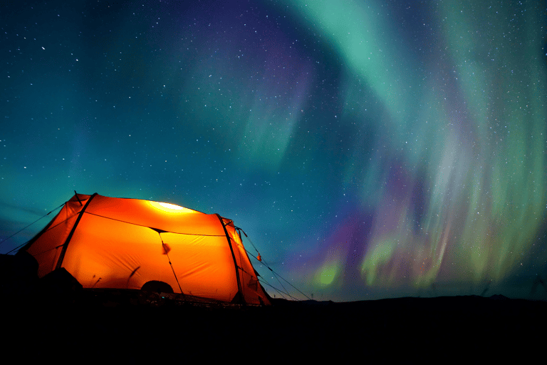 europe-finland-lapland-northern-lights-tent-snow