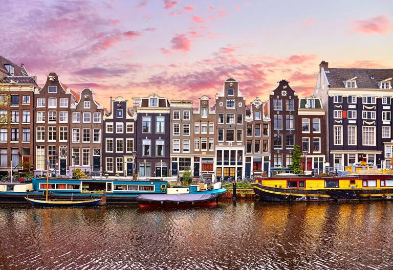 europe-netherlands-amsterdam-canal-sunset-pink