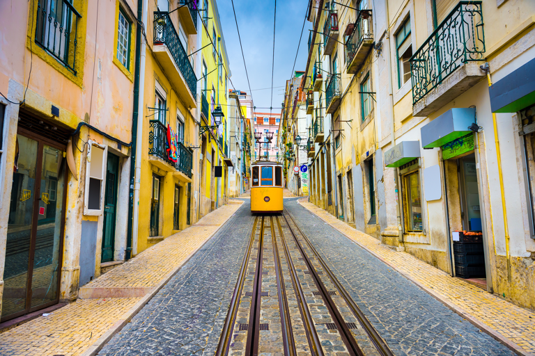 europe-portugal-lisbon-tram-middle-old-houses