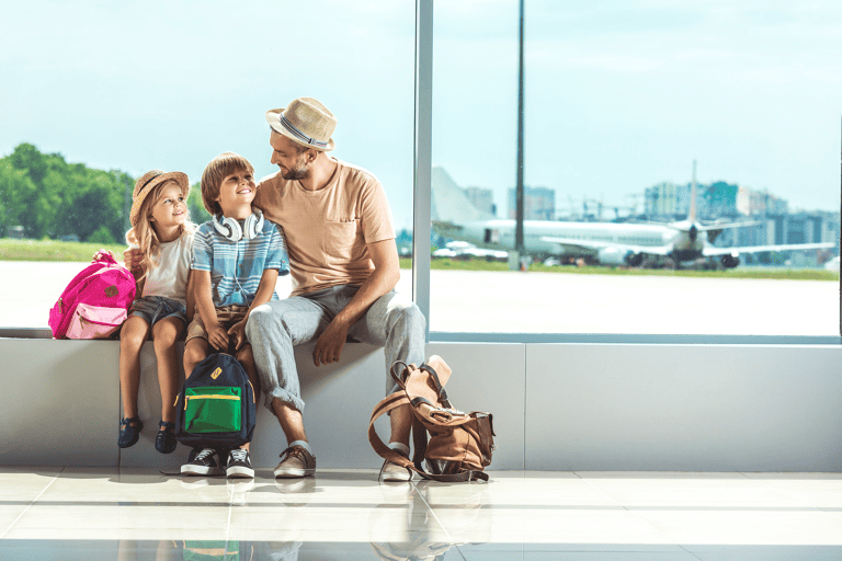 family-kids-parent-dad-airport-vacation