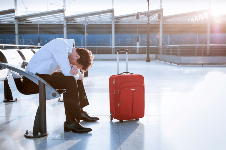 general-airport-stressed-traveler-suitcase