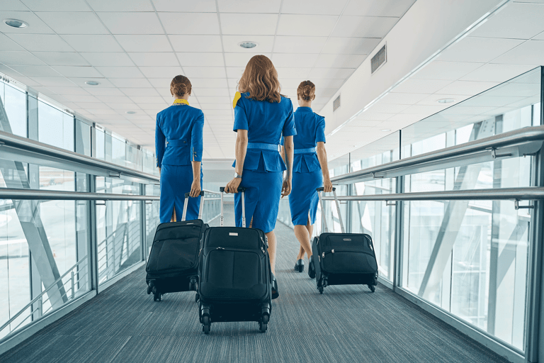 generic-airline-cabin-attendant-heading-towards-airplane
