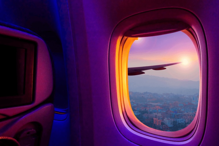 generic-airplane-cabin-dim-sunset-sunrise-window-wing