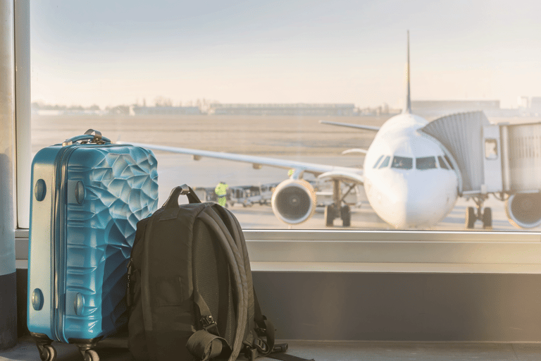 generic-airplane-gate-baggage-blue-suitcase-backpack