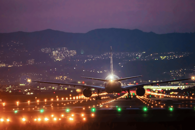 generic-airplane-outside-at-night-runway-airport