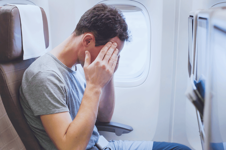 generic-airplane-passenger-fear-headache