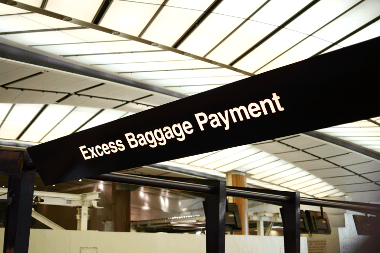 generic-airport-sign-excess-baggage-payment