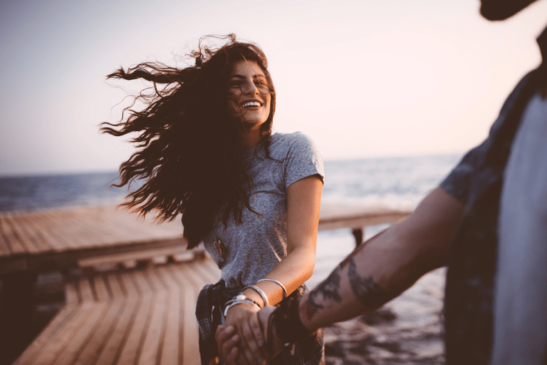 generic-couple-holding-hands-ocean-cyprus