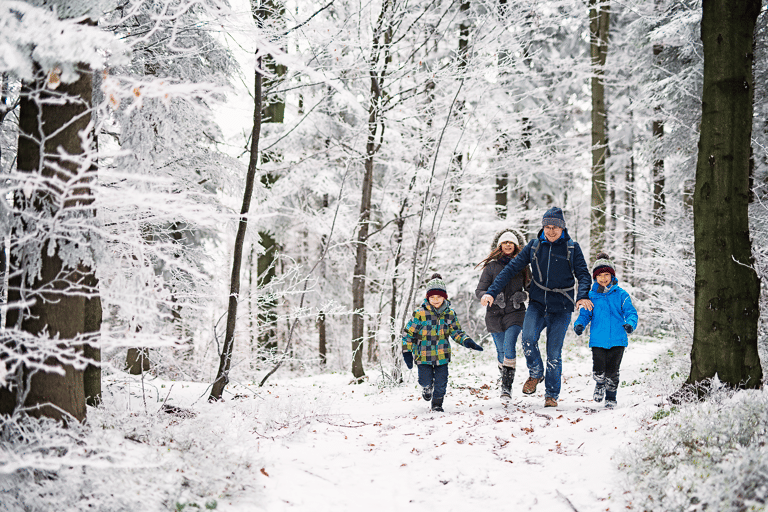 generic-family-kids-hiking-snow-forest
