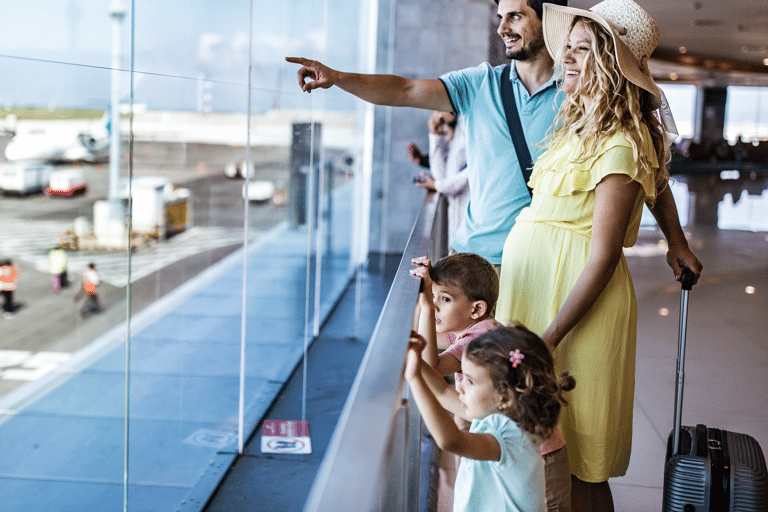 generic-family-traveling-with-pregnant-woman