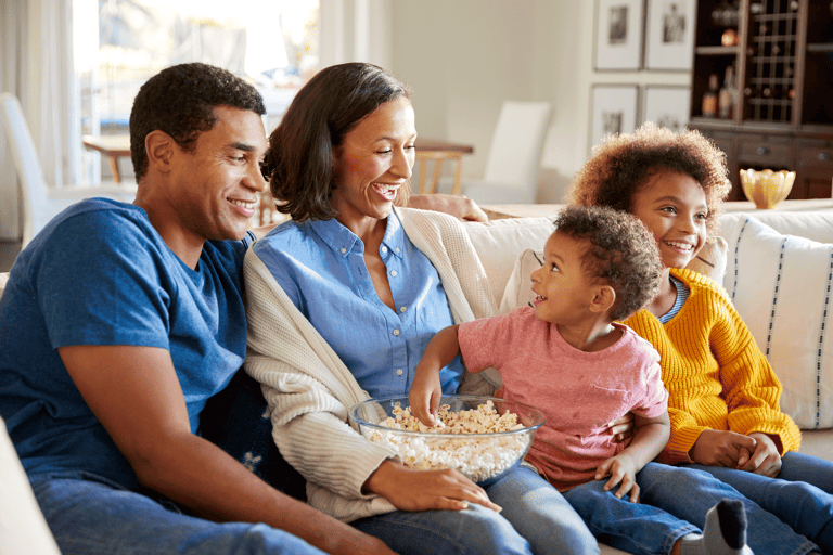 generic-family-watching-movie-snack-popcorn