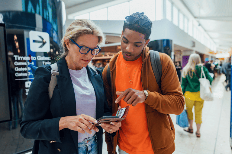 generic-female-male-travel-looking-direction-mobile-phone
