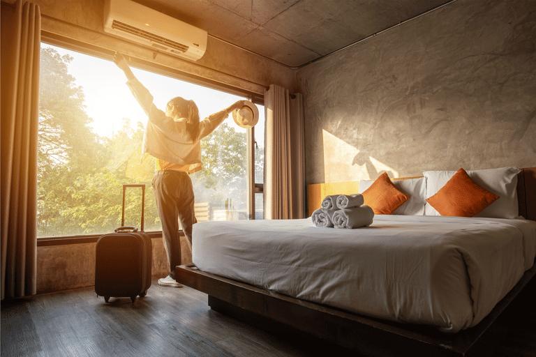 generic-female-stretching-arms-arrival-hotel-travel