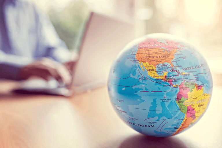 generic-globe-travel-planning-laptop