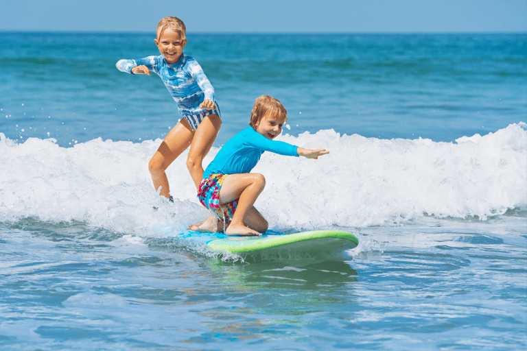 generic-kids-surfing-wave