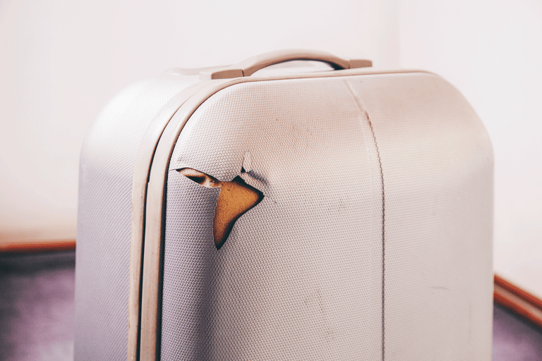 generic-luggage-suitcase-damaged-front-side