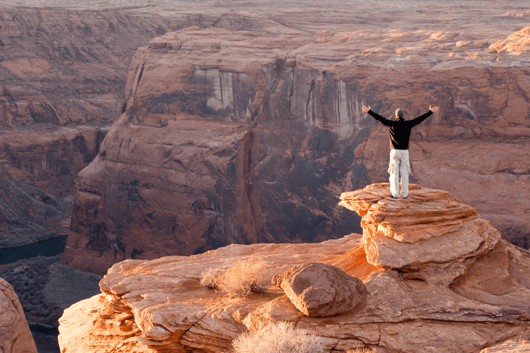 generic-man-grand-canyon-view-arms-spread