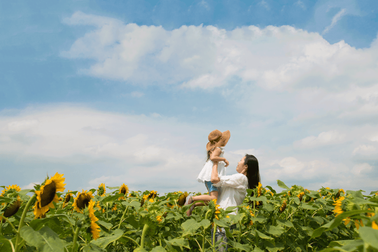 generic-mother-daughter-sunflower-field-blue-sky