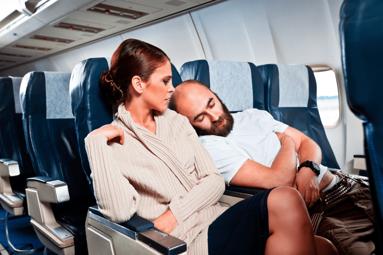 generic-passengers-in-airplane-sleeping-on-shoulder
