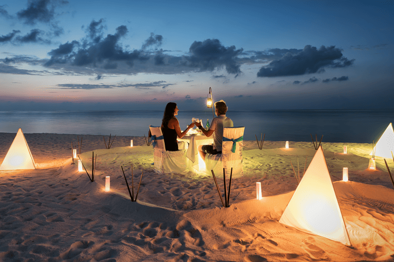 generic-people-dining-at-beach-with-lights