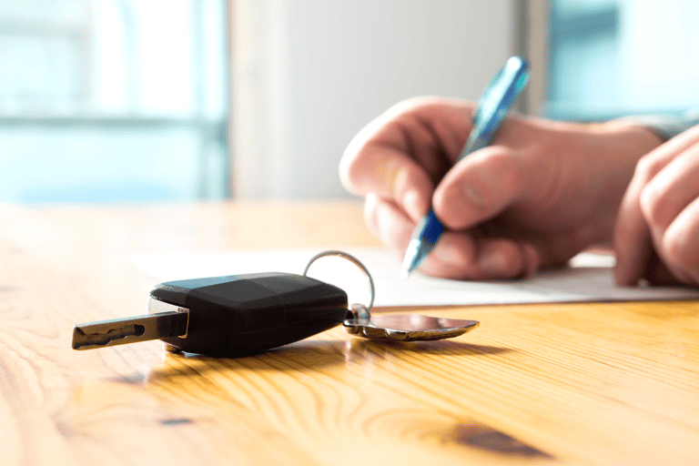 generic-renting-a-car-signing-papers-car-key