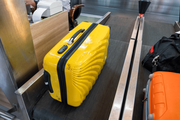 generic-suitcase-yellow-airport-check-in-on-scale
