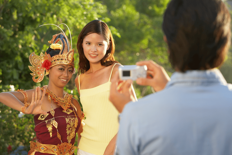 generic-tourist-taking-photo-together-with-performer
