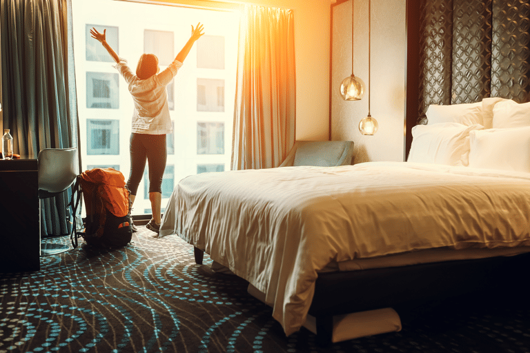 generic-traveler-backpacker-in-luxurious-hotel-room