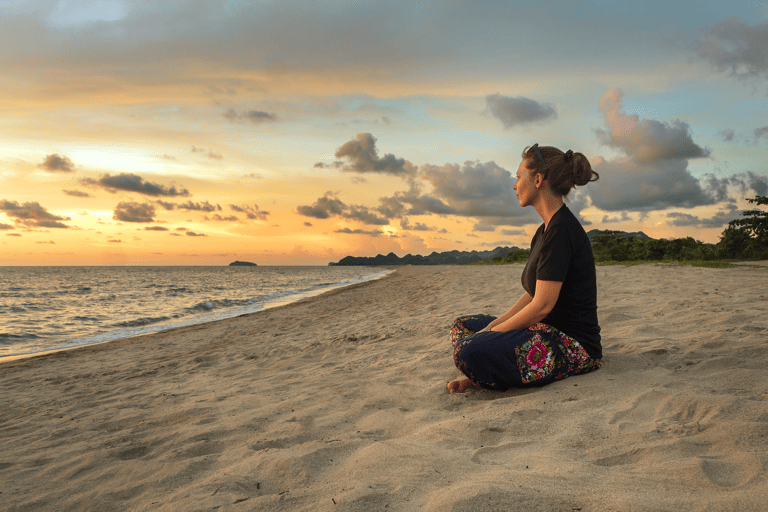 generic-woman-beach-thinking-meditating