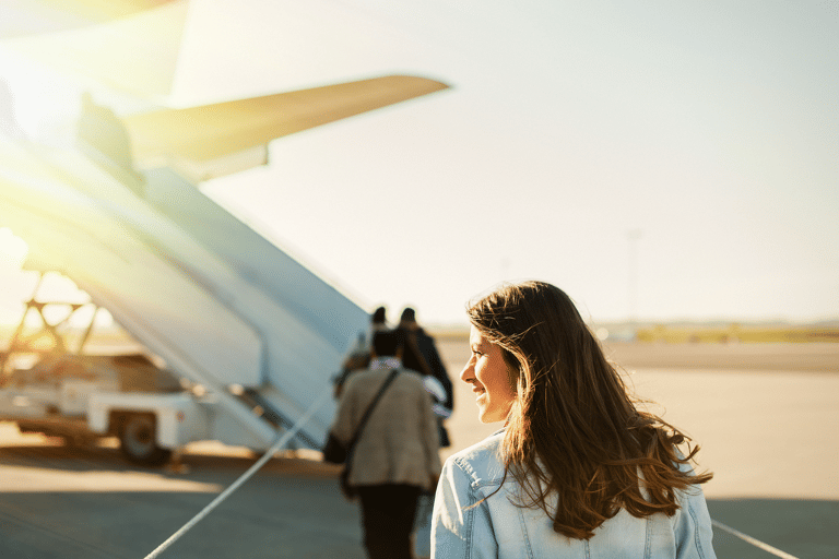 generic-woman-boarding-plane-airport