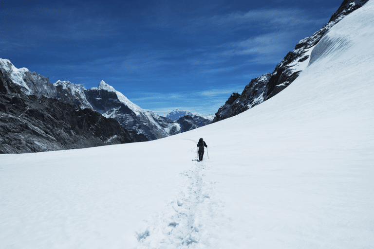 generic-woman-hiking-mountain-snow-canva