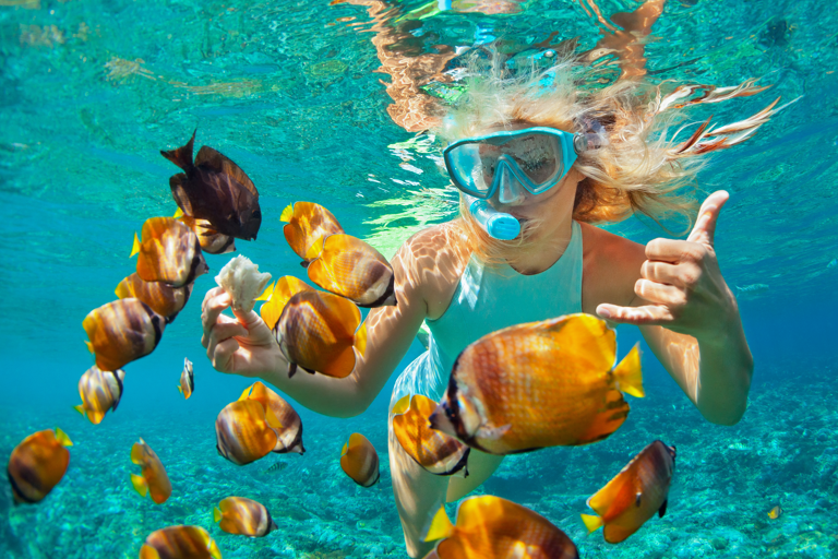 generic-woman-snorkling-fish