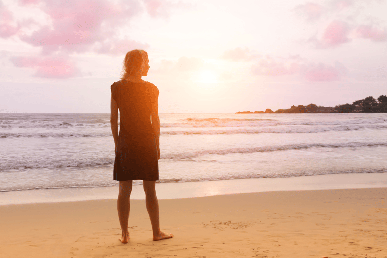 generic-woman-thinking-beach-sunset
