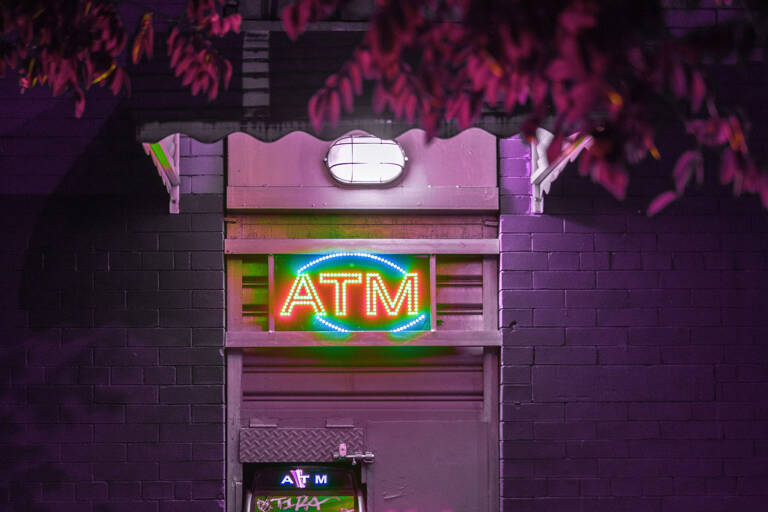 neon-purple-atm-machine